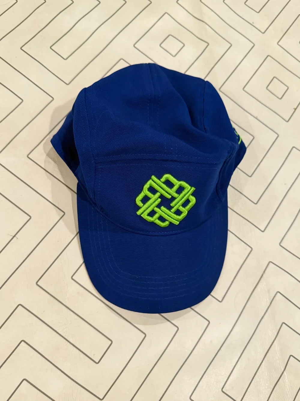 Betenly Blue Athletic Cap with Neon Green Knot Logo